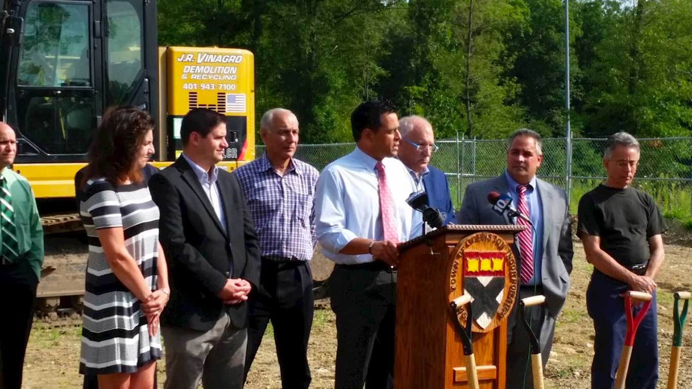 Photo of attorney Russo delivering a speech at a groundbreaking ceremony